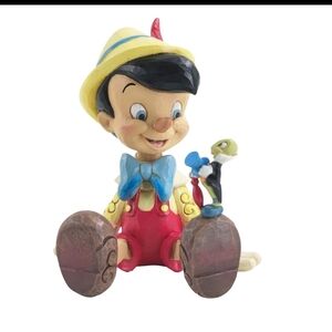 Jim Shore Disney Traditions Pinocchio & Jiminy Sitting Figurine  NostalgicPiece